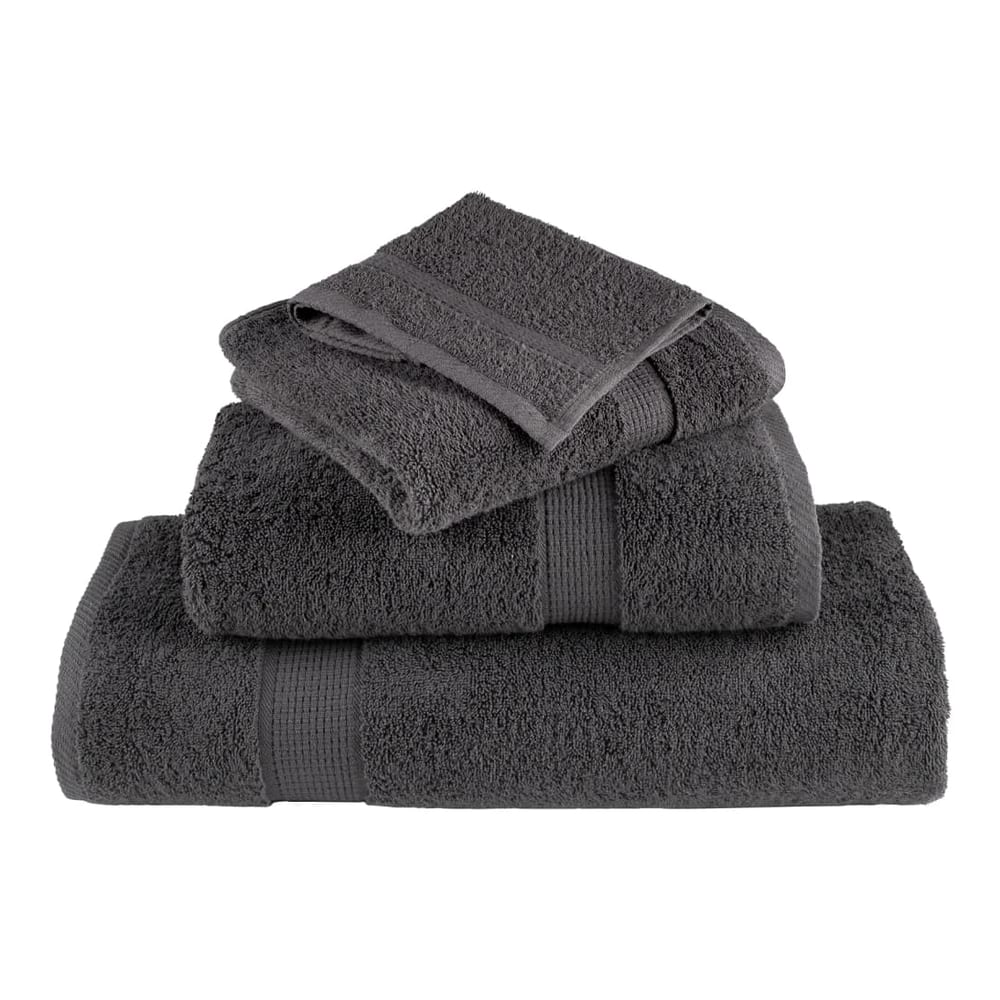 the shower towels folded in a decorative pile to show the texture and layering