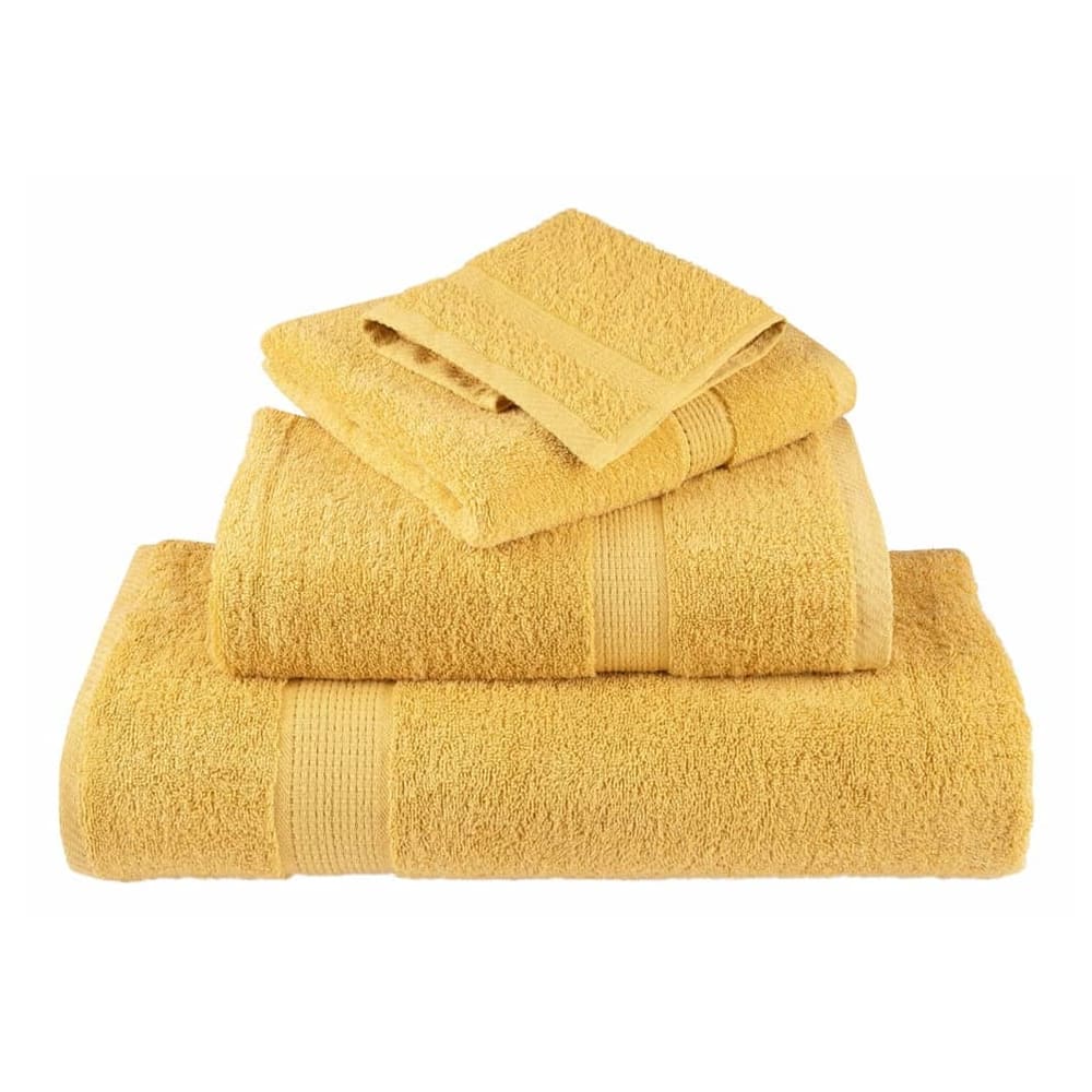 The gold bath towels folded in different sizes