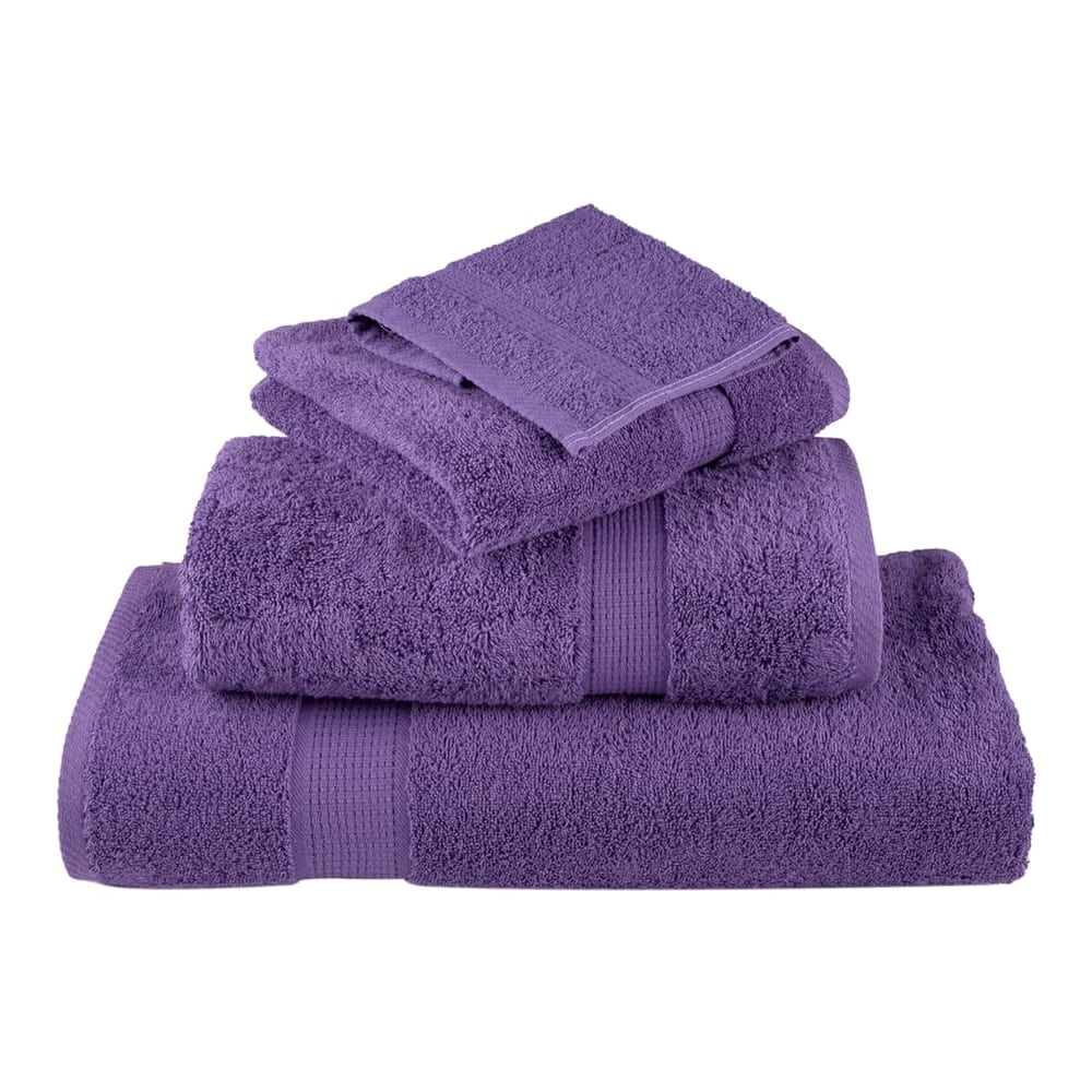 A pile of three purple SOLUND towels, one folded on top of another