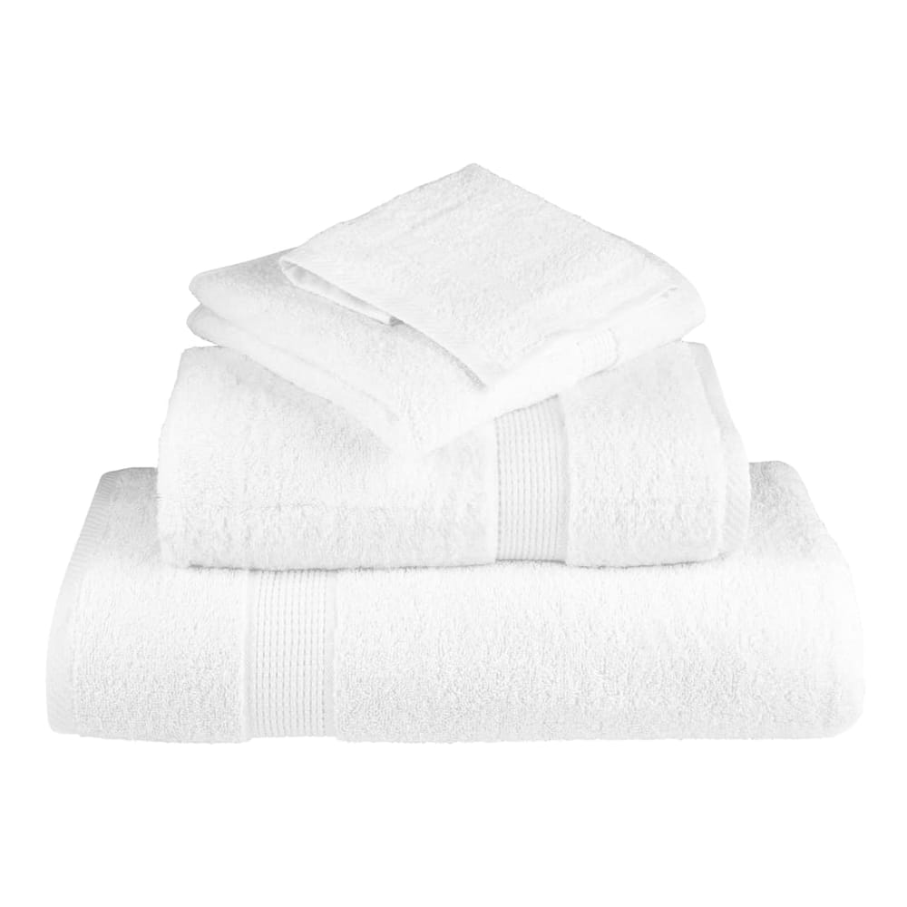 A stack of four white towels of varying sizes