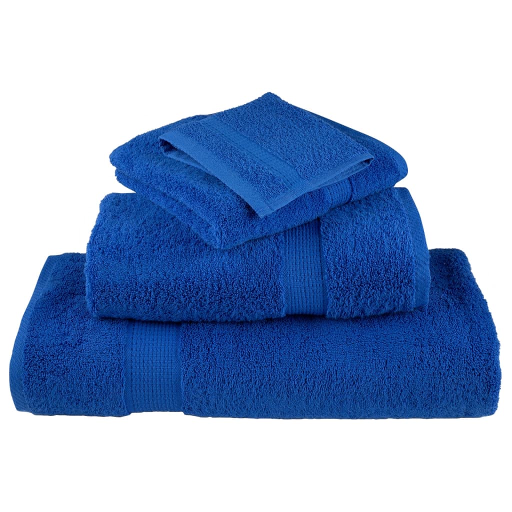 A stack of three blue sauna towels with a smaller folded towel on top