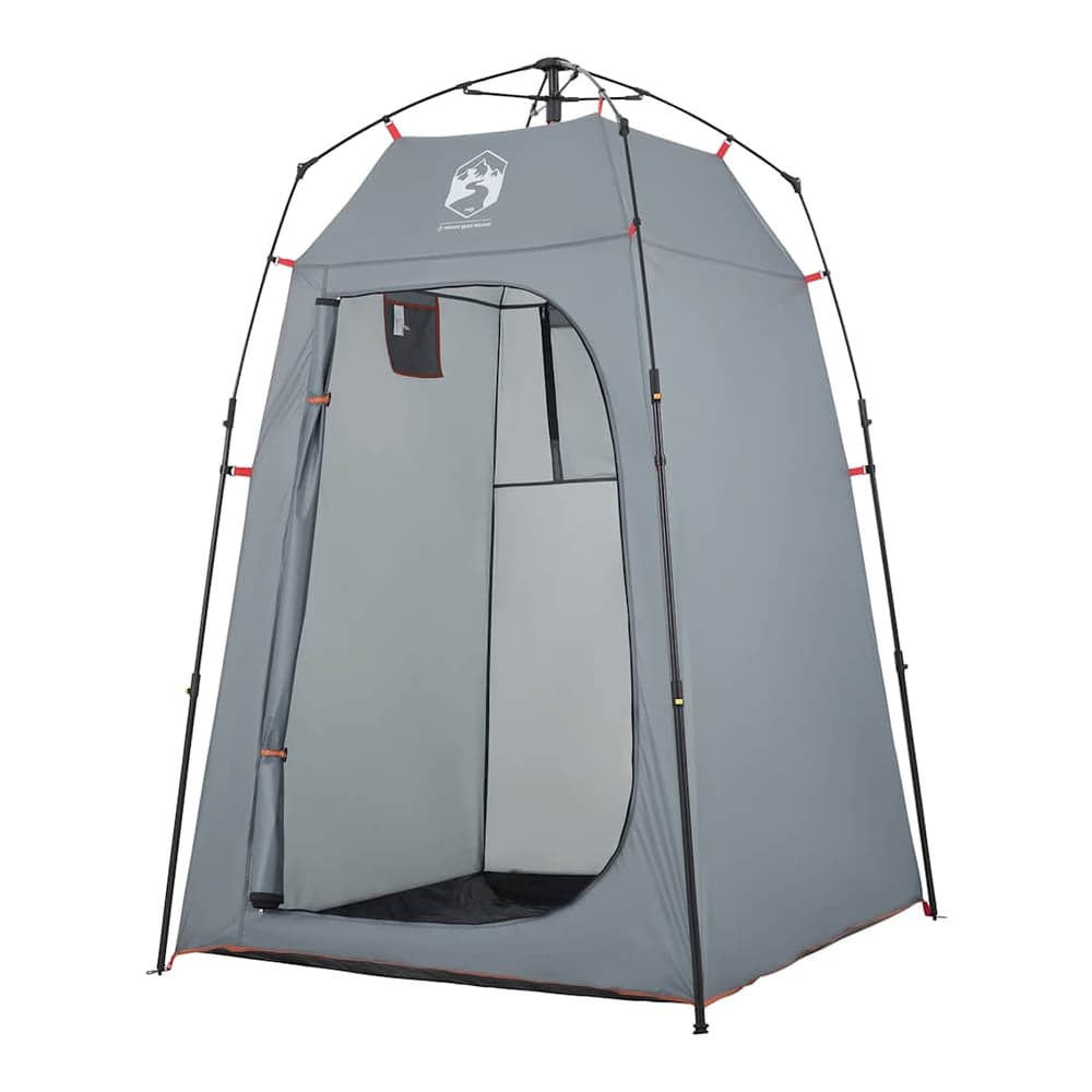 Grey privacy tent with the door partially open, set up in a grassy area