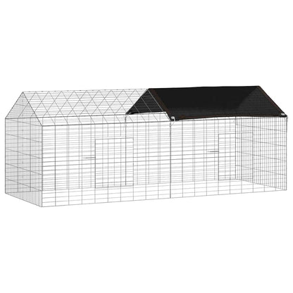 The large galvanised steel rabbit hutch with a black roof section and two doors
