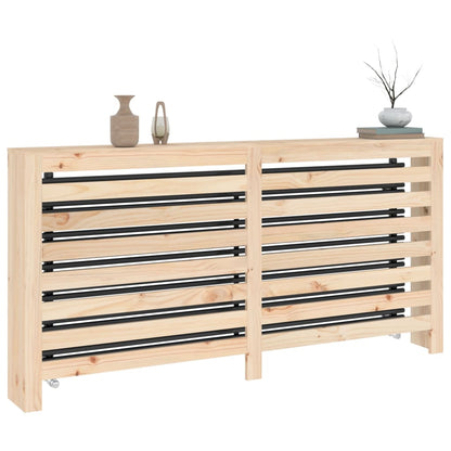 the radiator cover with decorative items on top, showing its slatted design and wooden frame
