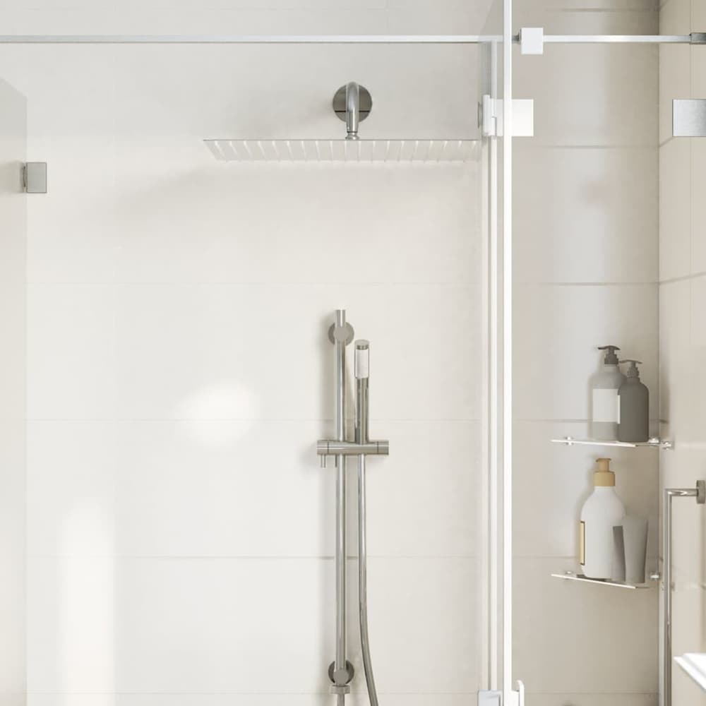 The square rain shower head mounted above a shower mixer and handset