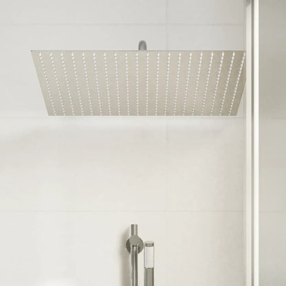 Underside view of the square rain shower head with many small holes