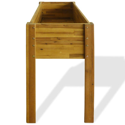 Side view of the wooden raised garden bed, showing its height and construction