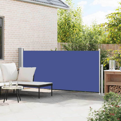 Blue retractable side awning providing privacy on a sunny patio with seating and a table