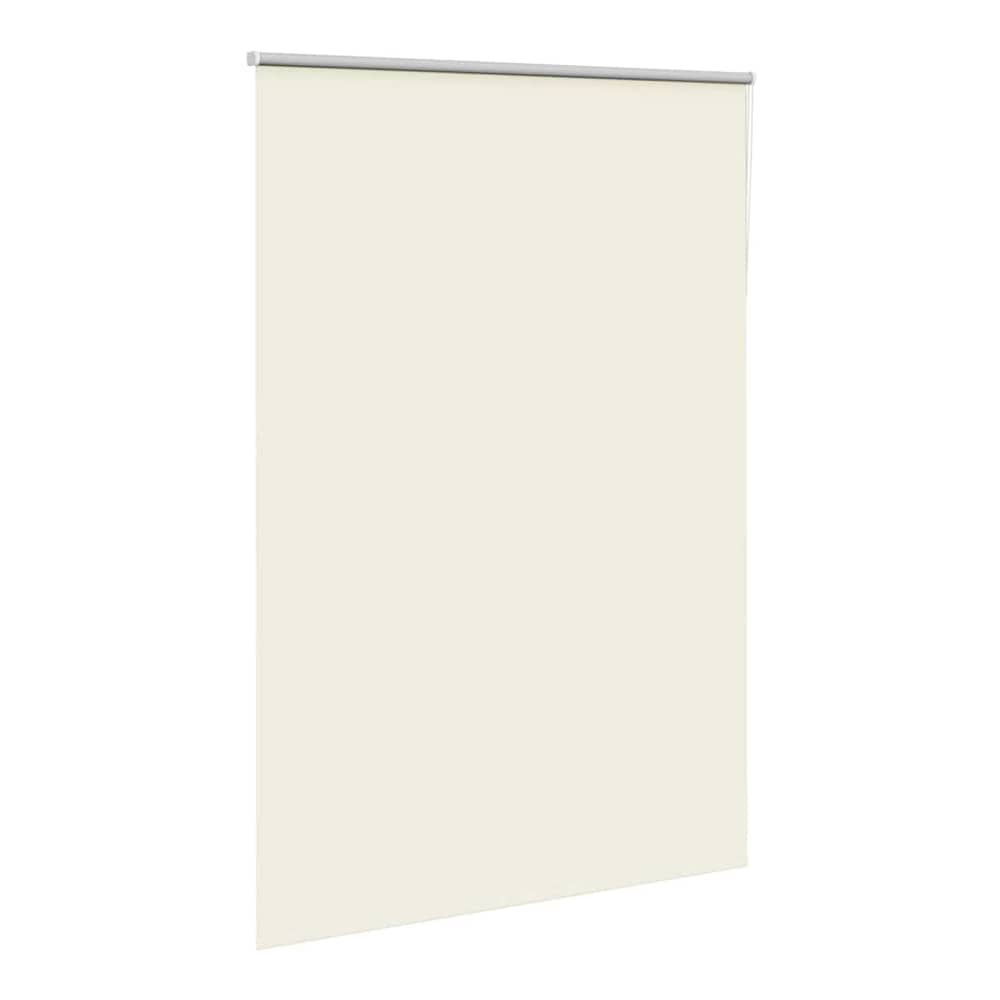The off white blackout roller blind hanging down, showing its full length and plain fabric