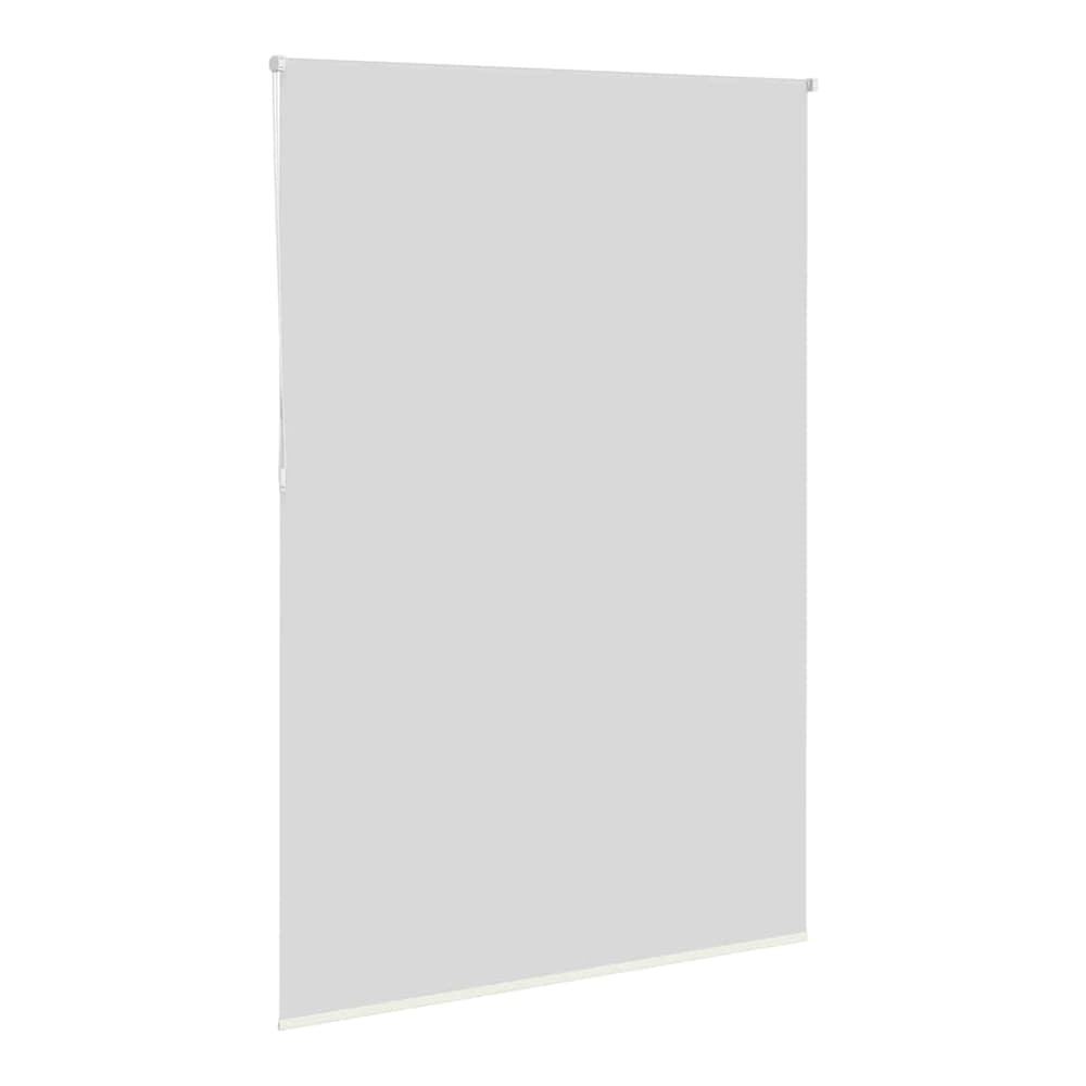 The off white blackout roller blind, shown hanging and angled from the left