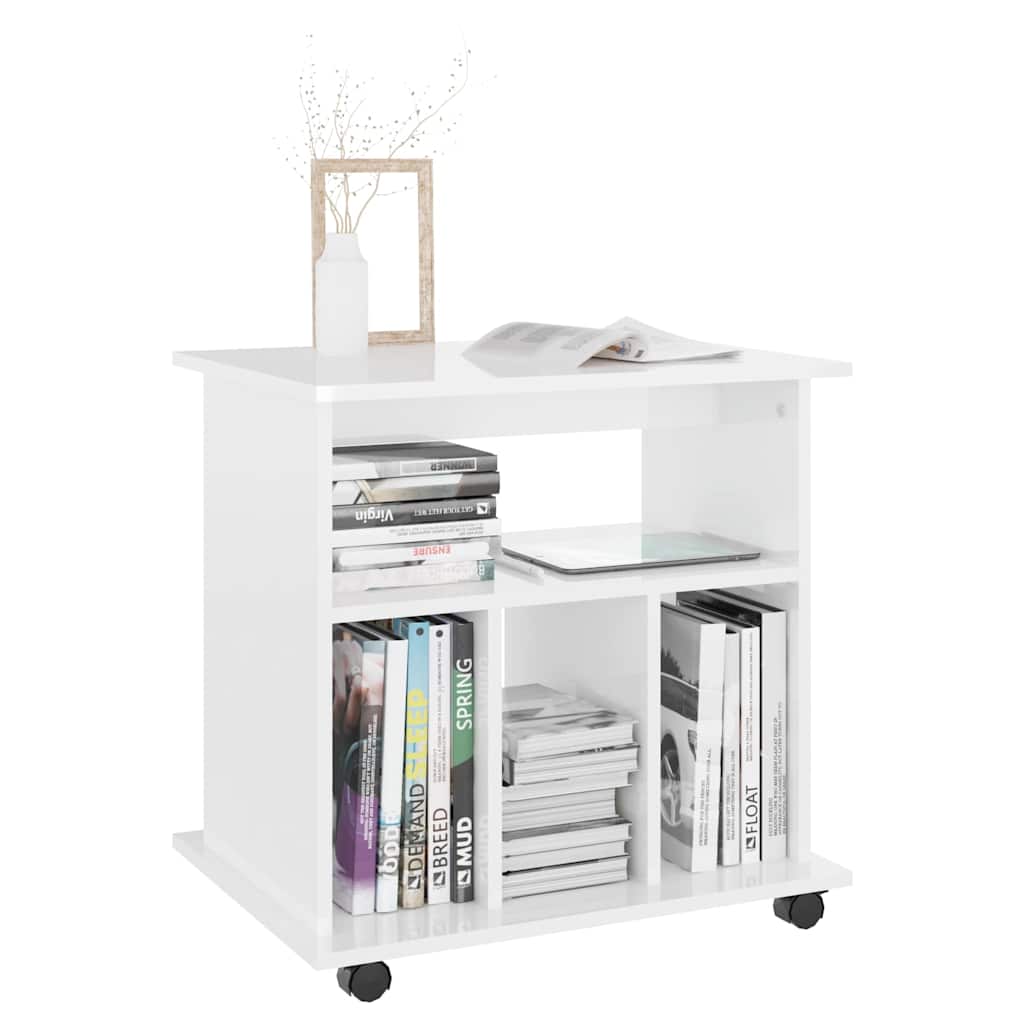 The white storage cabinet filled with books and a tablet