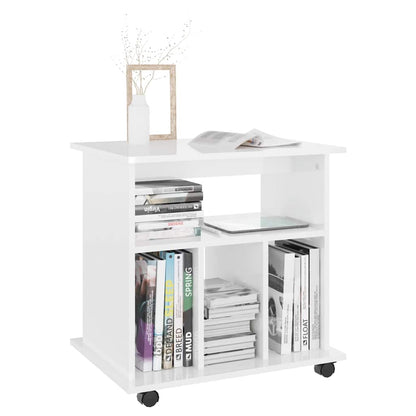 The white storage cabinet filled with books and a tablet
