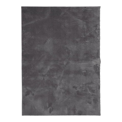 Anthracite short pile rug laid flat on a wooden floor