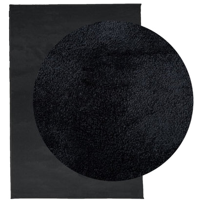The black rug showing its short pile texture and a magnified detail