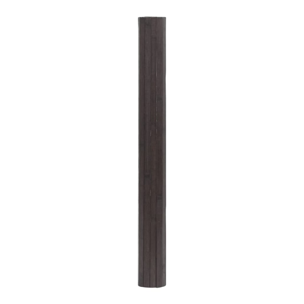 The dark brown bamboo rug, rolled up vertically against a white background