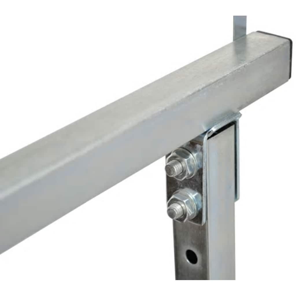 Close-up of the metal connection points and bolts on a scaffolding trestle