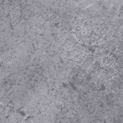The flooring planks featuring a close-up of the weathered cement effect pattern