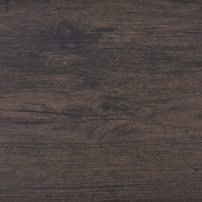 A section of the dark brown self-adhesive flooring planks showing the wood pattern