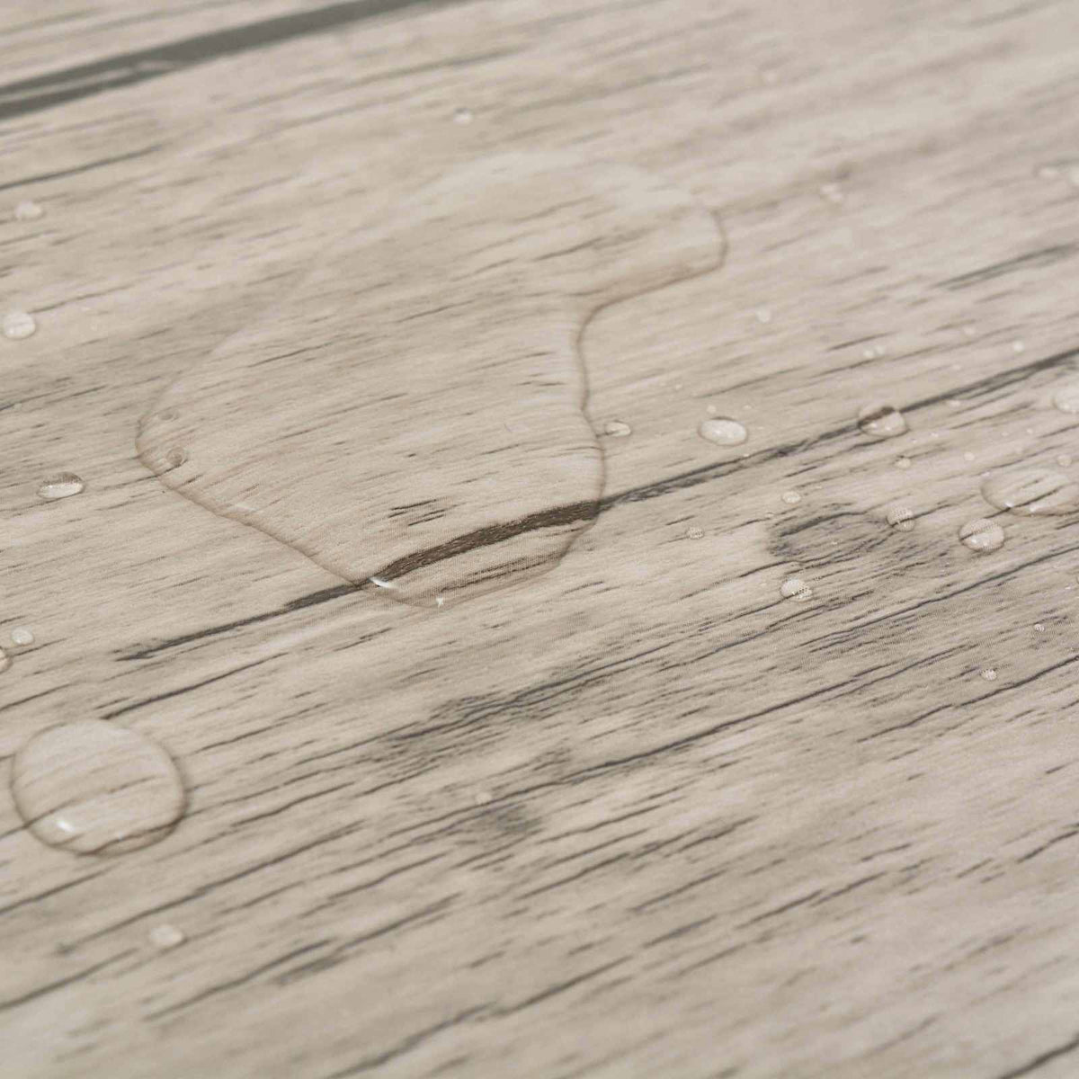 Water droplets on the surface of the PVC flooring planks