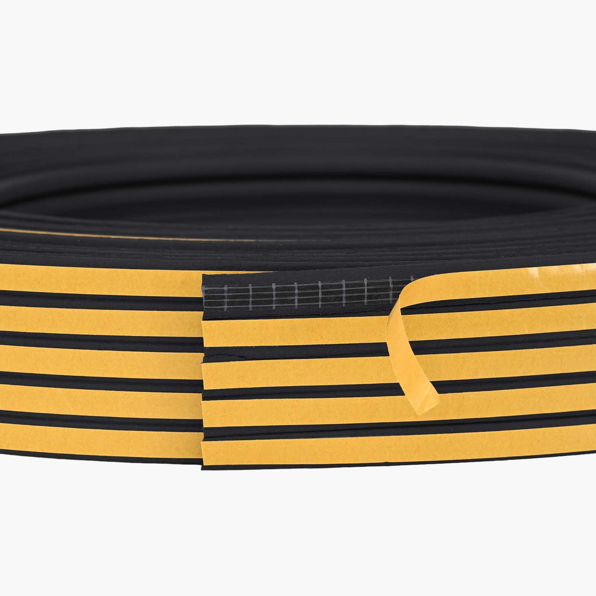 A close-up of the black foam seal's edge, showing the adhesive strips