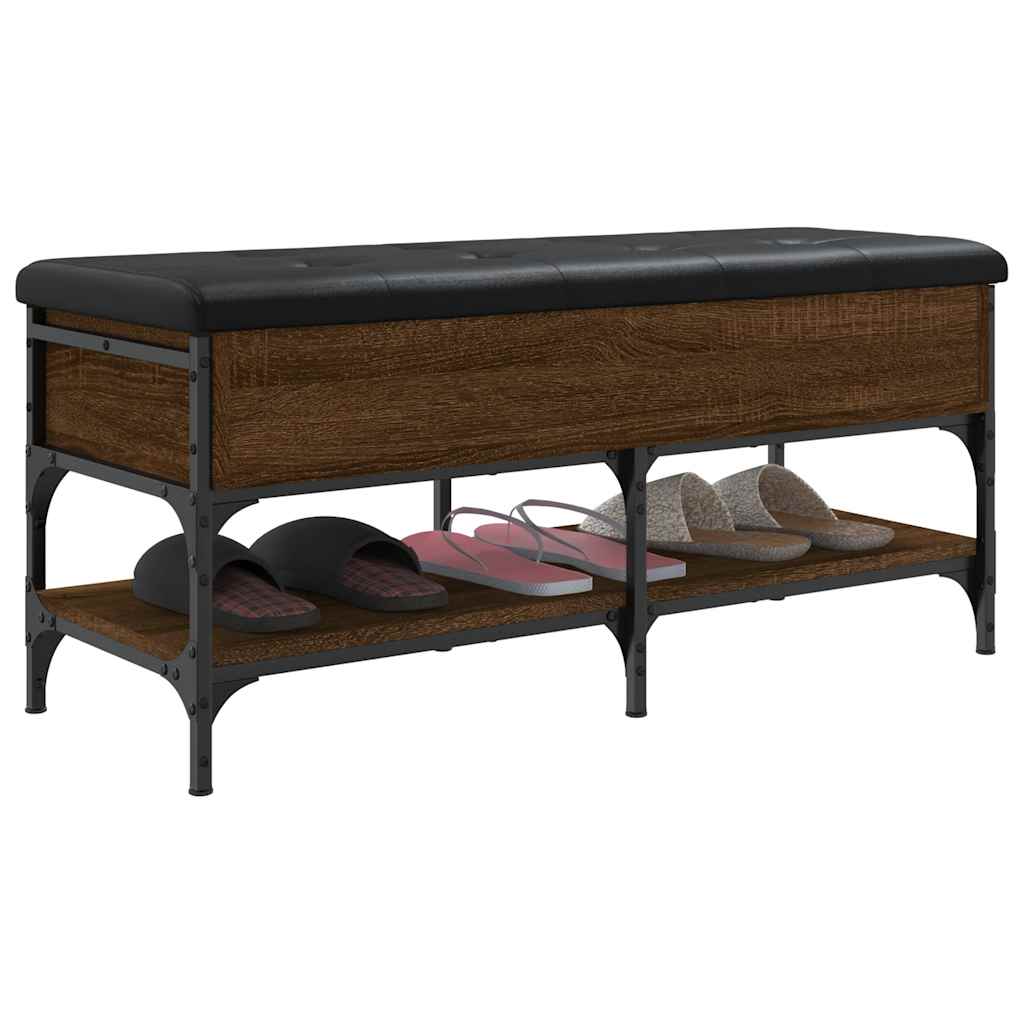 A storage bench with a padded seat and two open shelves for shoes