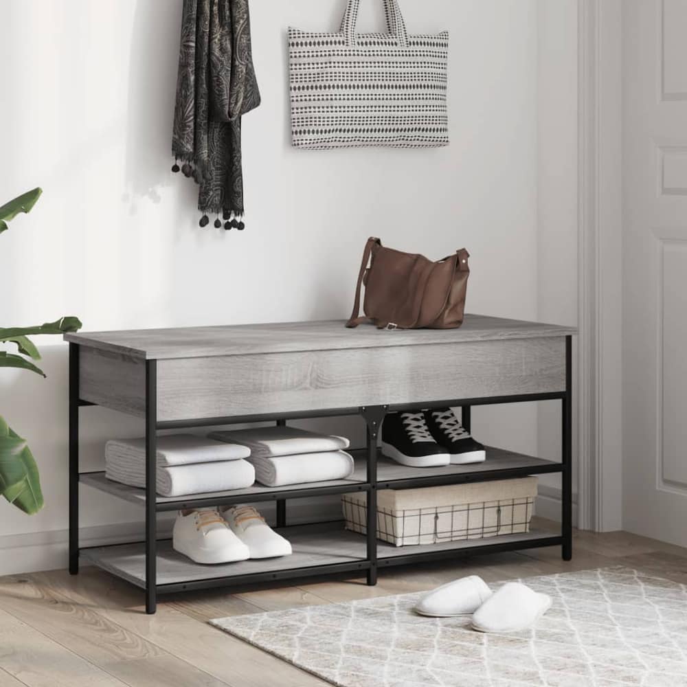 the storage and entryway bench in a hallway setting with shoes and bags