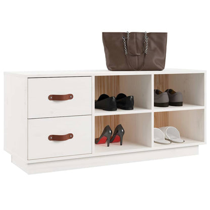 The shoe rack with a brown handbag on top and shoes on the shelves