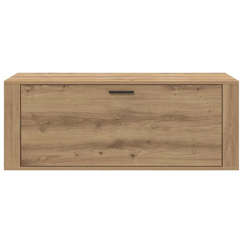 the shoe cabinet viewed directly from the front showing the wood grain and black handle