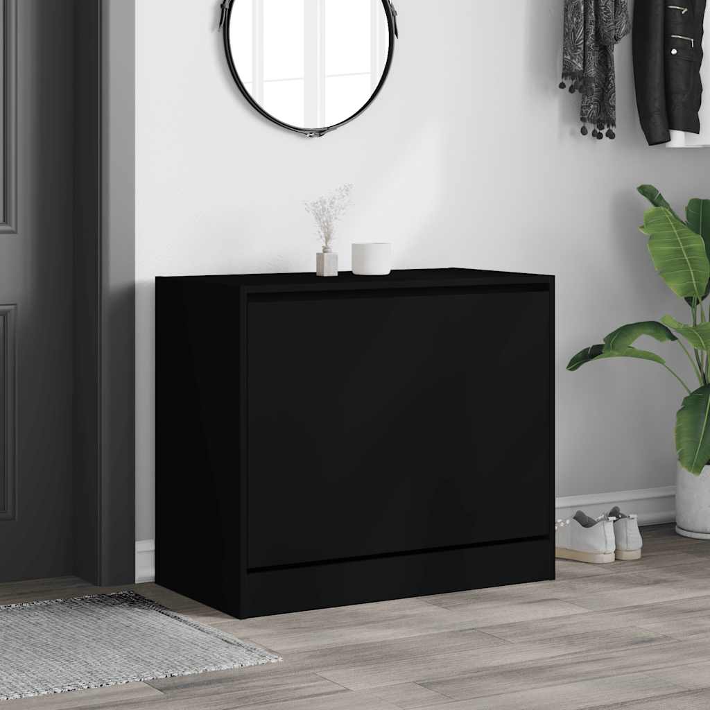The shoe cabinet placed in a modern hallway setting with a mirror and plant nearby