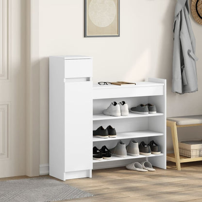 The shoe cabinet in a hallway with shoes on the shelves
