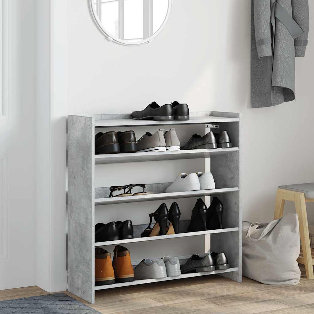 This shoe organiser is shown in a hallway with shoes on the shelves and coats on a hook