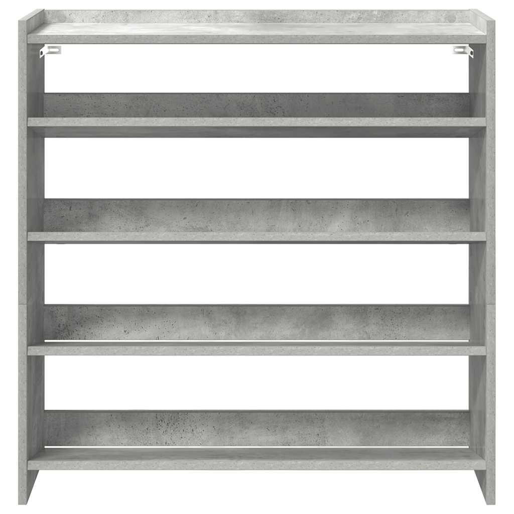 The shoe storage unit is made of engineered wood with a concrete grey effect