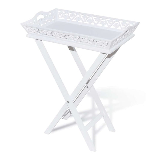 The white tray table with decorative cut-out edges and a folding base, shown from a low angle