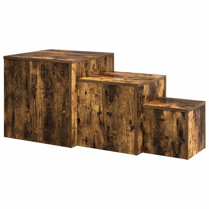 Three cube side tables of different heights arranged in a step formation