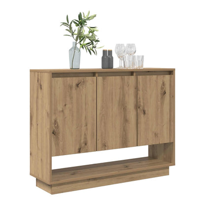 Buffet and sideboard with three doors and a shelf, decorated with glasses and a vase
