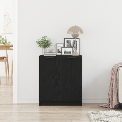 The black sideboard positioned in a bright room with home accessories