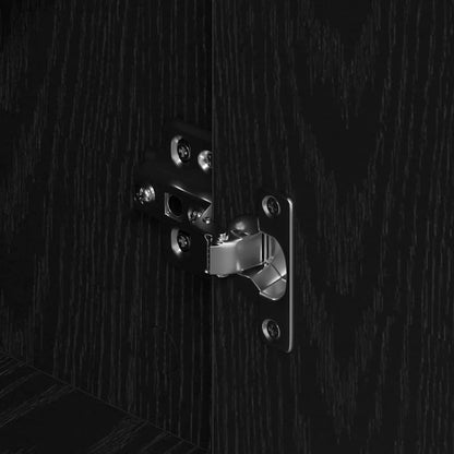 Close-up of the metal hinge on the black oak sideboard door