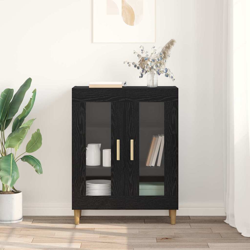 A black oak sideboard with glass doors and wooden handles, placed in a bright room with plants
