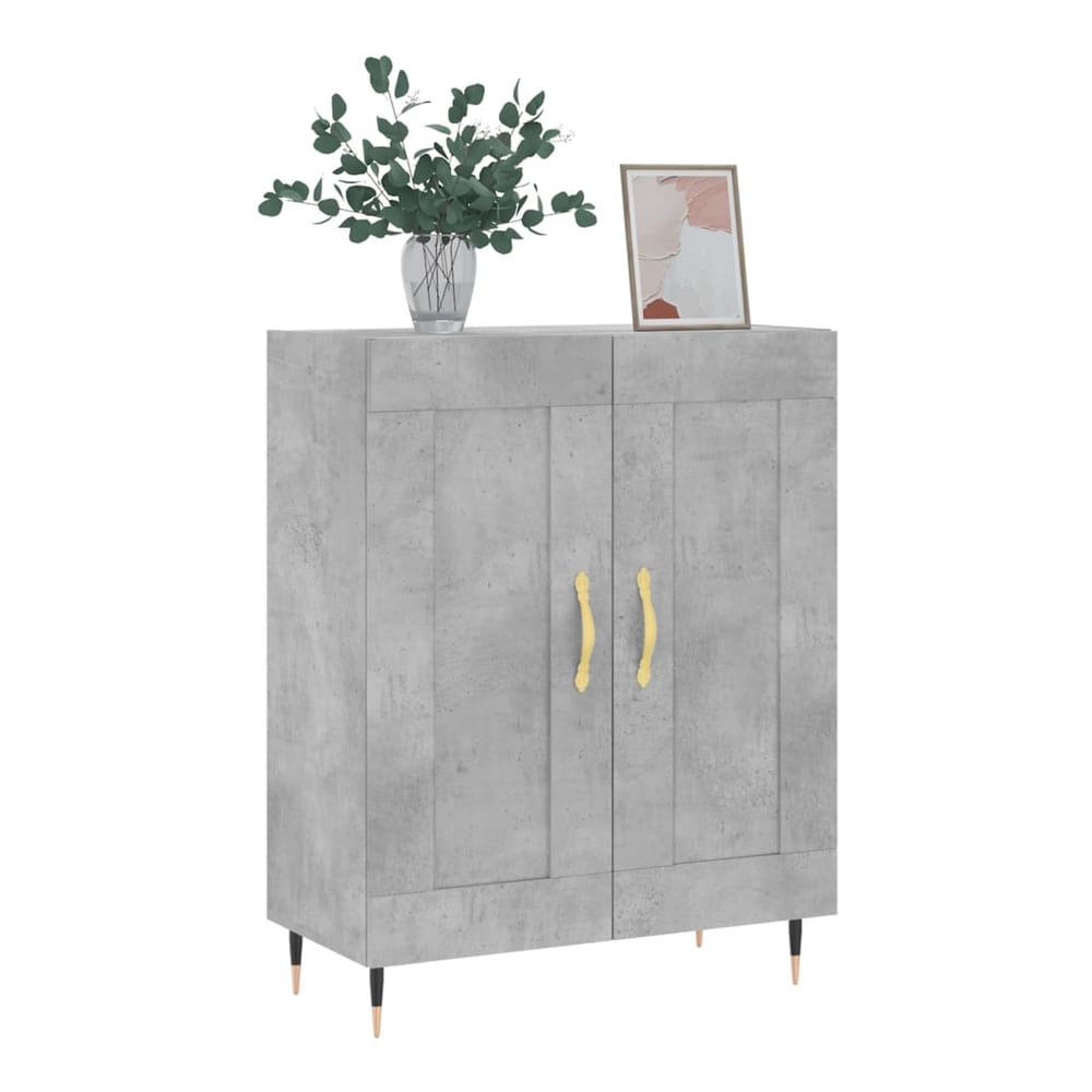 Concrete grey sideboard with gold handles and decorative items