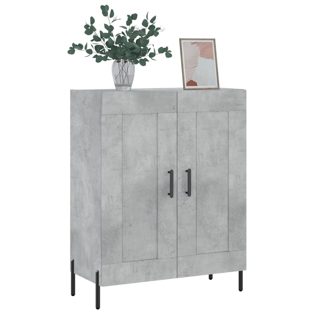 Concrete grey sideboard with two doors and black handles, with a plant and picture on top