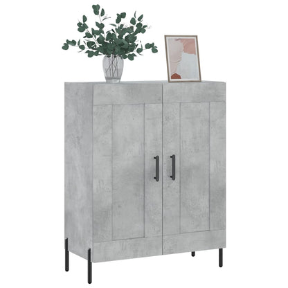 Concrete grey sideboard with two doors and black handles, with a plant and picture on top