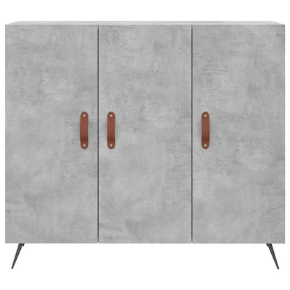 The concrete grey sideboard with brown handles, viewed from a slightly elevated front angle