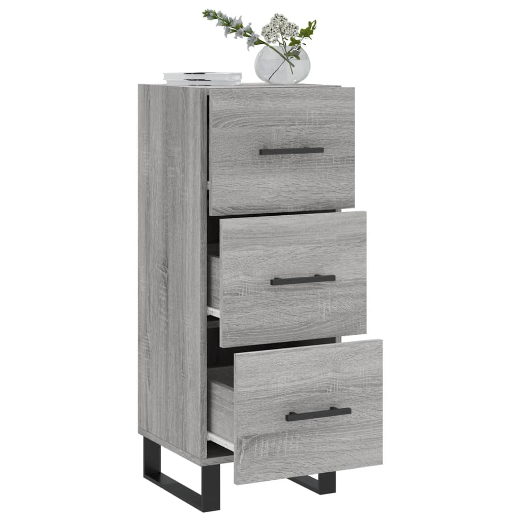 The narrow sideboard with all three drawers pulled out to show the storage space inside