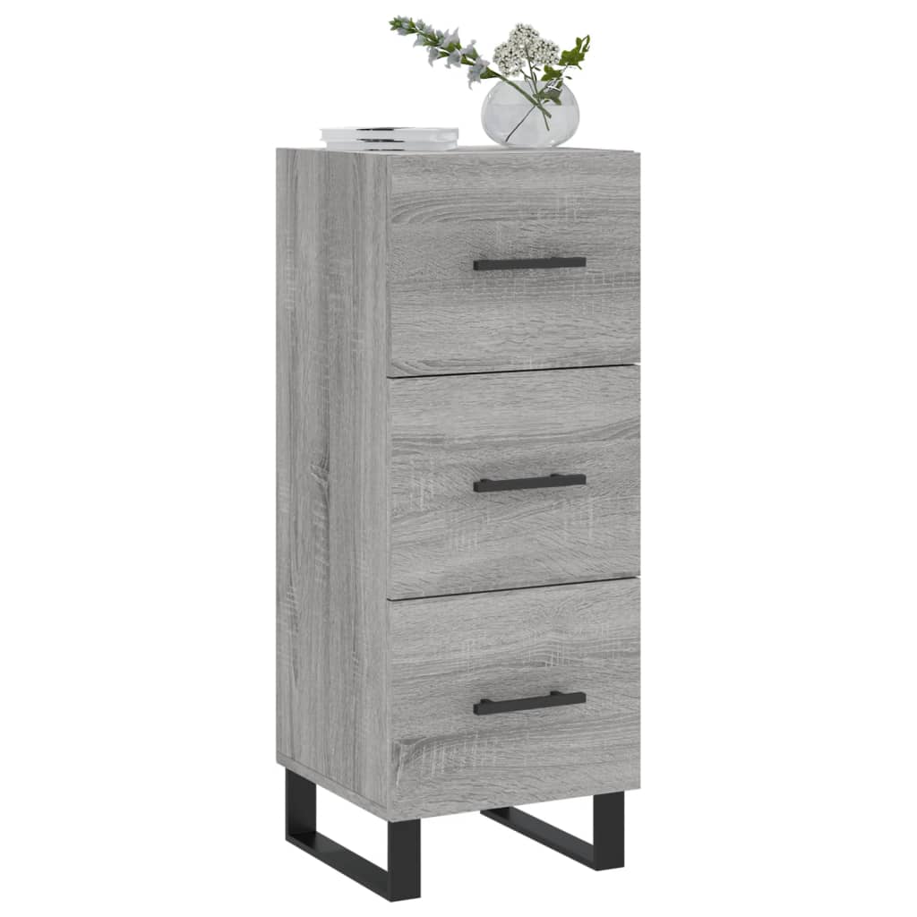 The tall sideboard featuring a wood grain finish and black handles topped with a glass vase