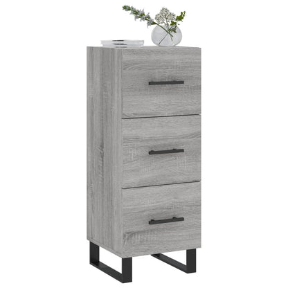 The tall sideboard featuring a wood grain finish and black handles topped with a glass vase