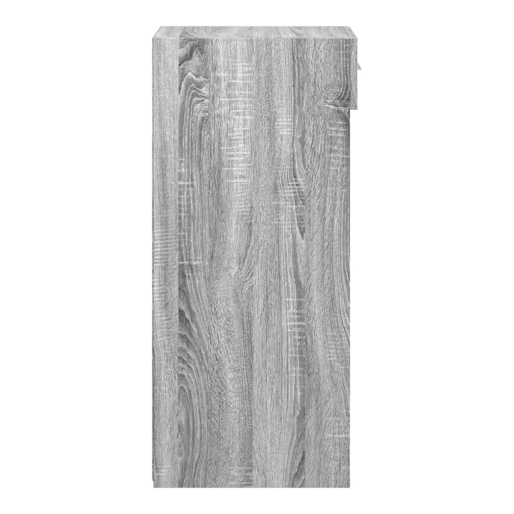 Side view of the grey sideboard showing its wooden texture