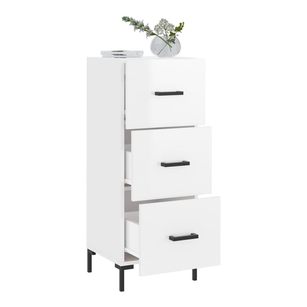 The white sideboard with the top two drawers open