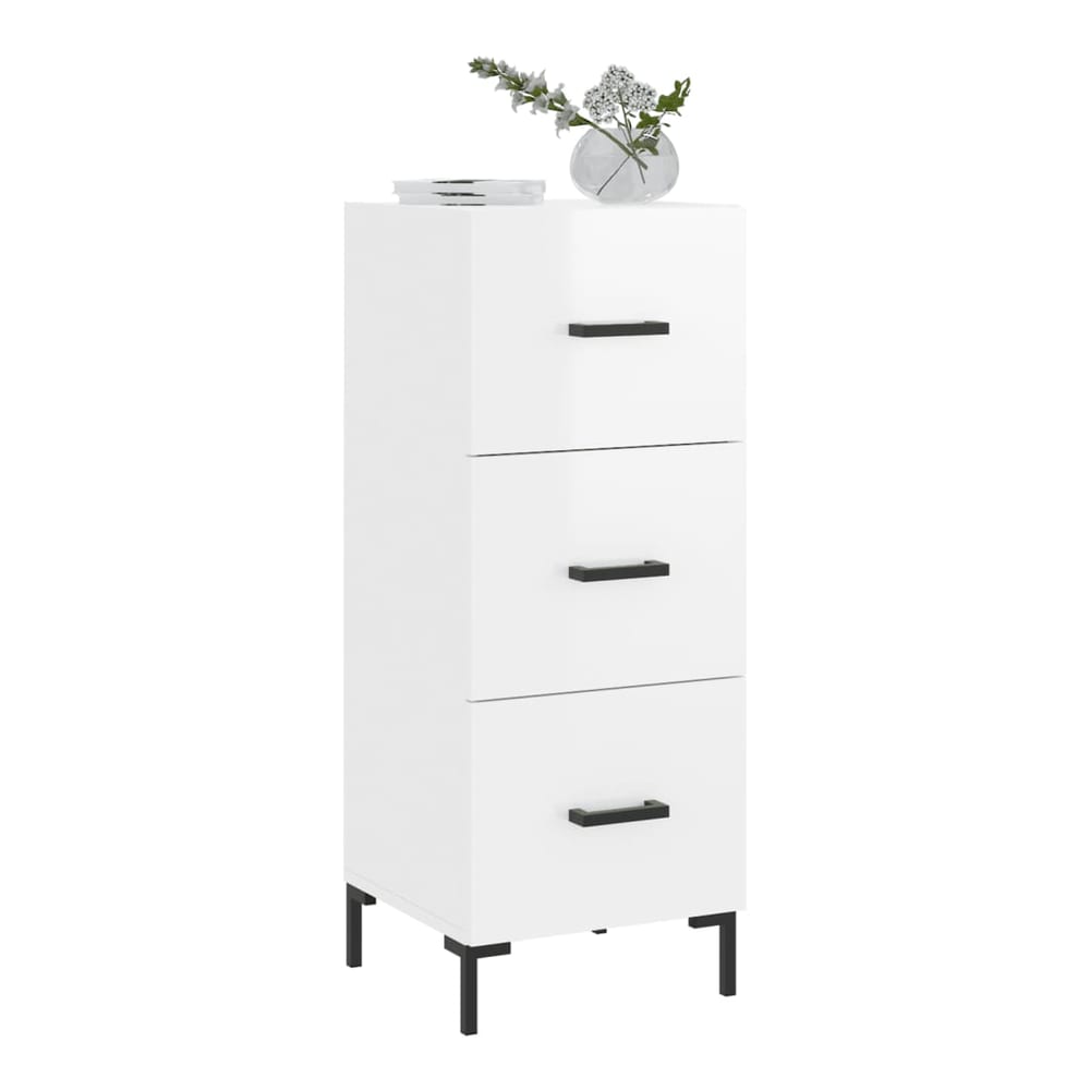 A white sideboard with three drawers, a vase on top