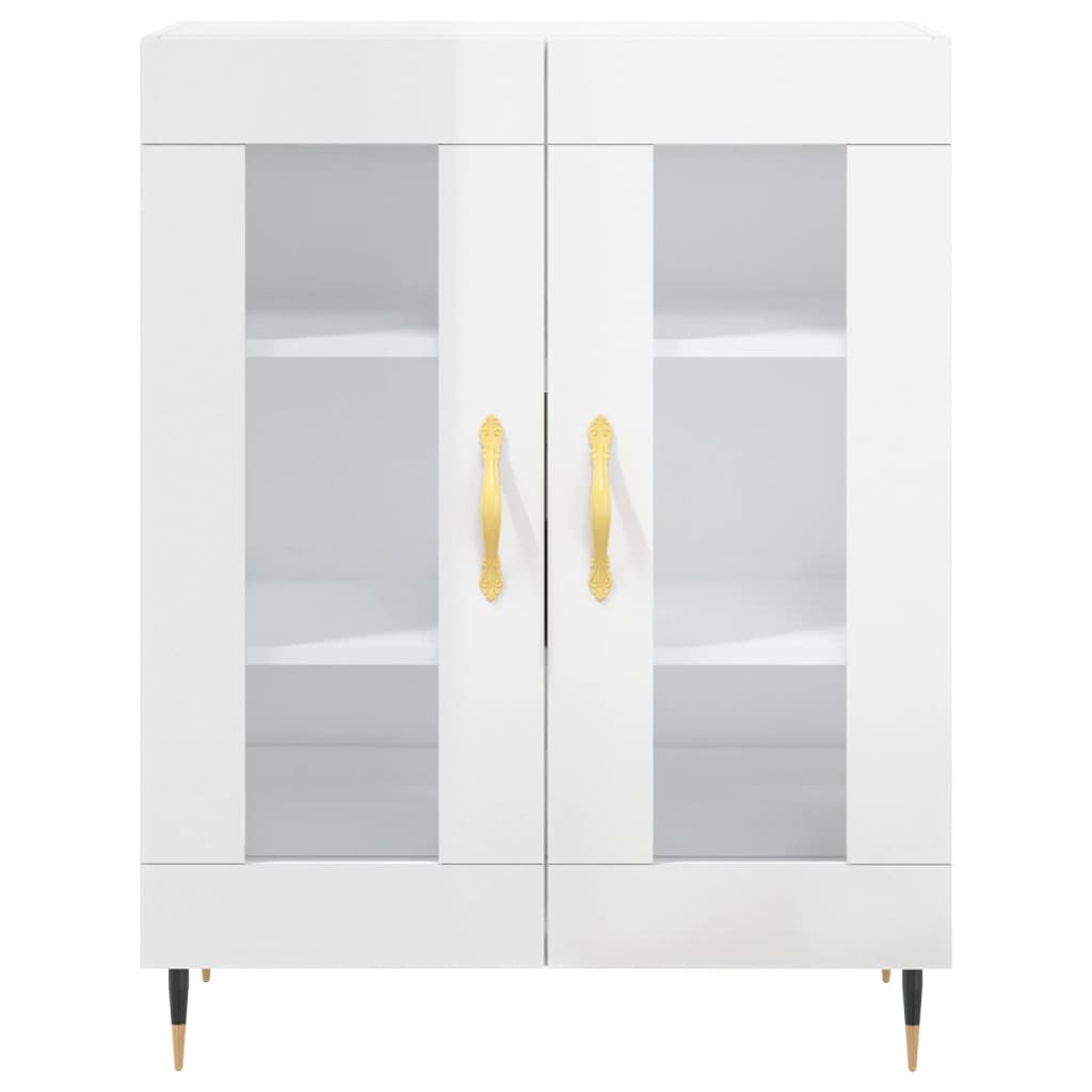 A white sideboard with glass doors and gold handles, on black and gold legs