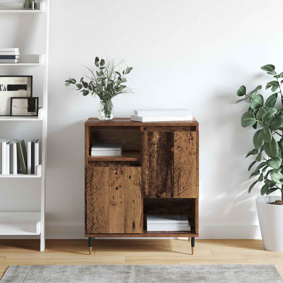 The wooden sideboard standing next to a white shelving unit in a minimalist room
